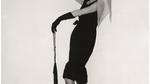 Audrey-hepburn-in-a-black-cocktail-dress-designed-by-french-couturier-hubert-de-givenchy-in-a-promotional-portrait-for-director-blake-edwardss-film-breakfast-at-tiffanys-1961